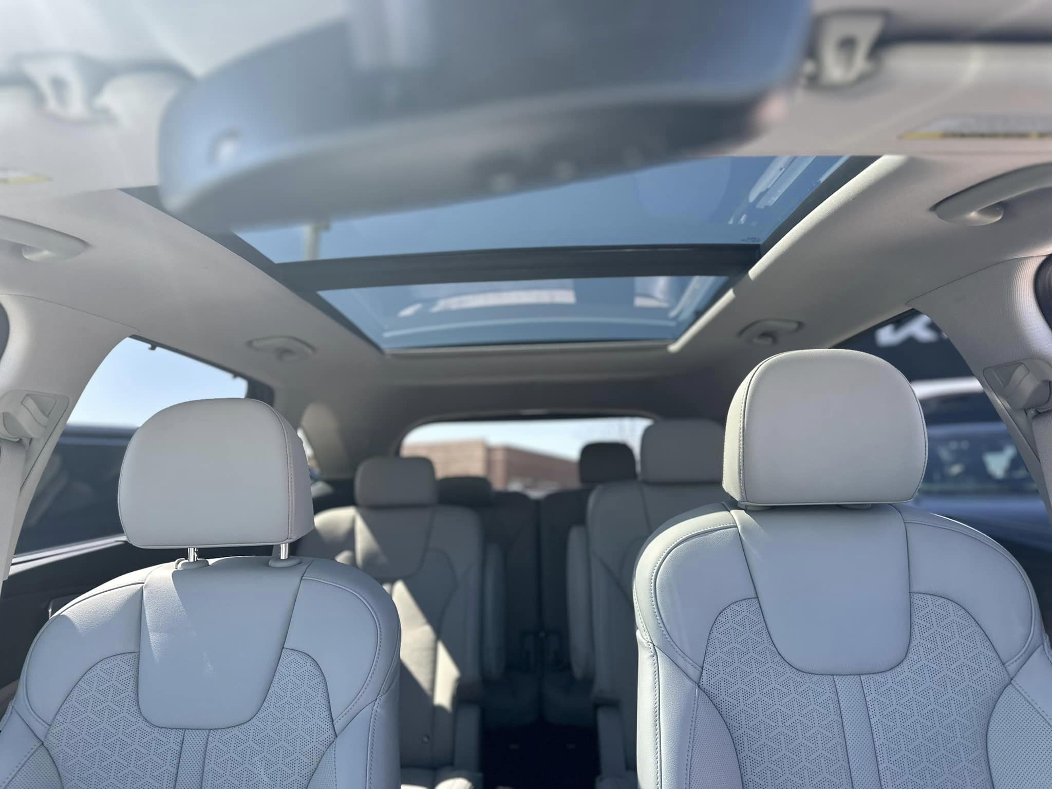 2023 Kia Sportage - Gravity Blue - HEV Hybrid SX Prestige Trim - Front to Back Interior View
