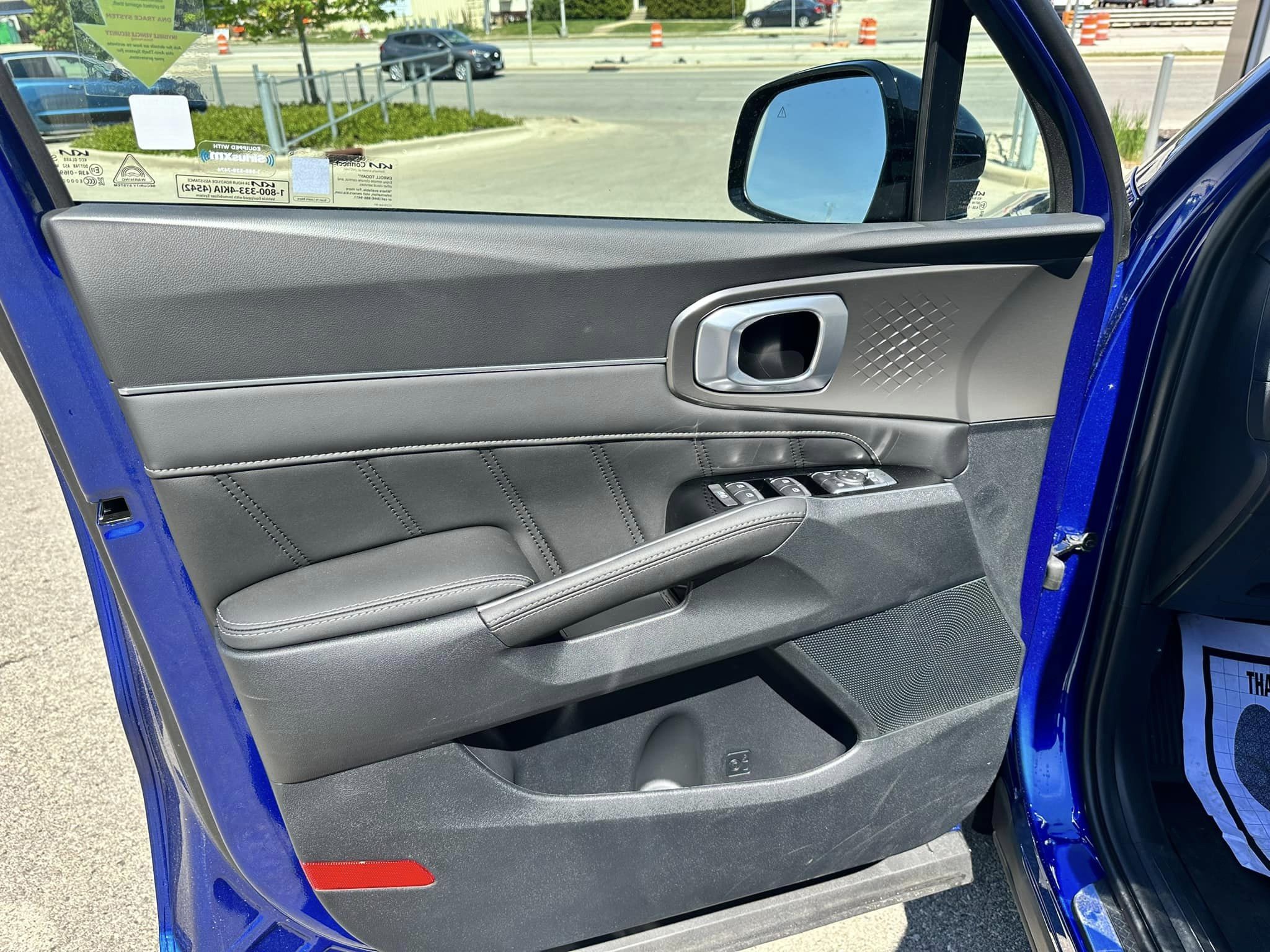2023 Kia Sportage - Sapphire Blue - SX AWD Trim - Driver Door