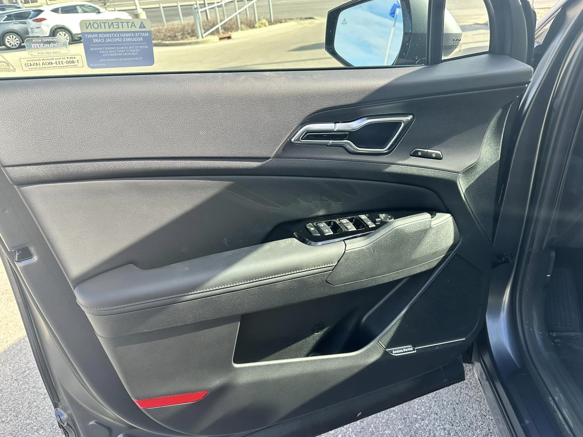 2024 Kia Sportage - Matte Gray/Black Interior - Hybrid HEV SX Prestige Trim - Driver Door