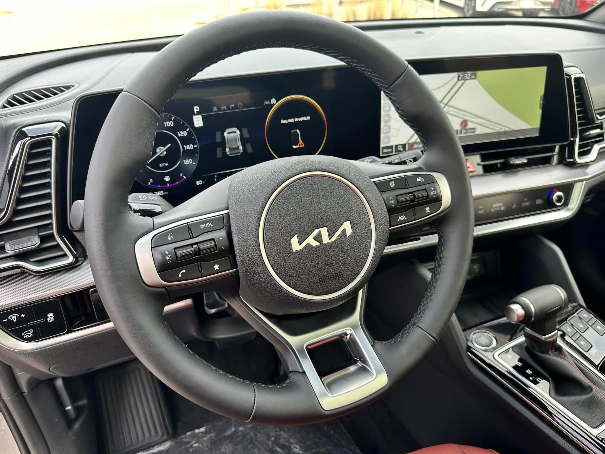 2024 Kia Sportage - Wolf Gray/Carmine Red Interior - SX Prestige Trim - Steering Wheel View