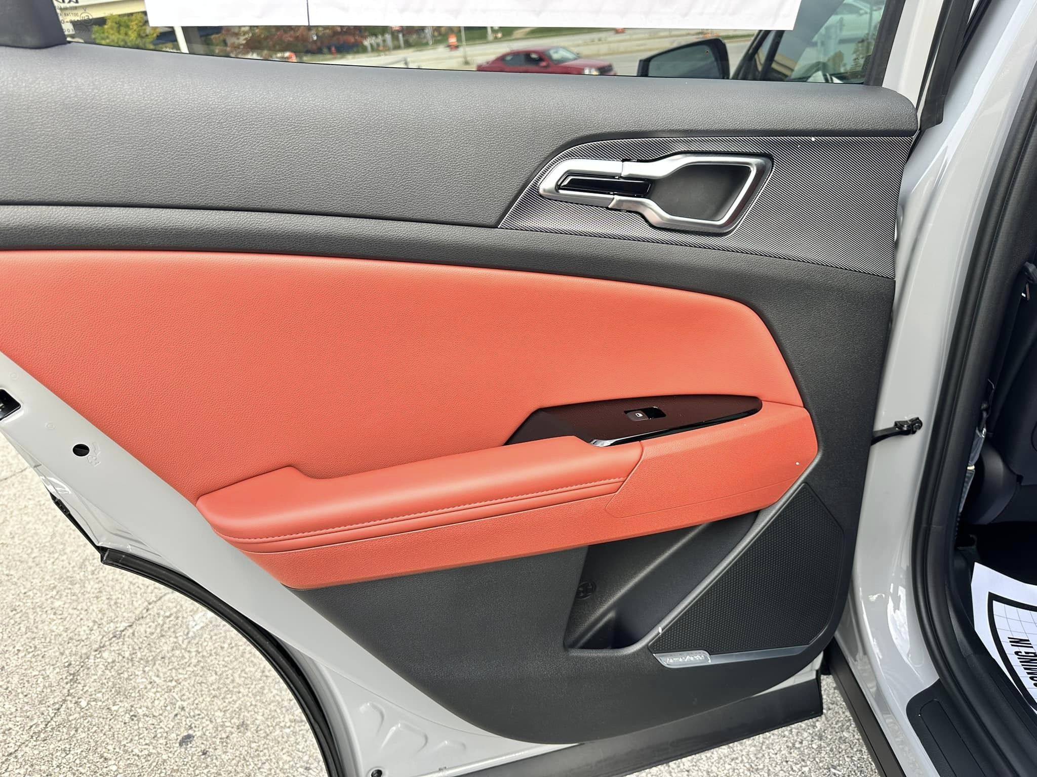 2024 Kia Sportage - Wolf Gray/Carmine Red Interior - SX Prestige Trim - Rear Door Inside View
