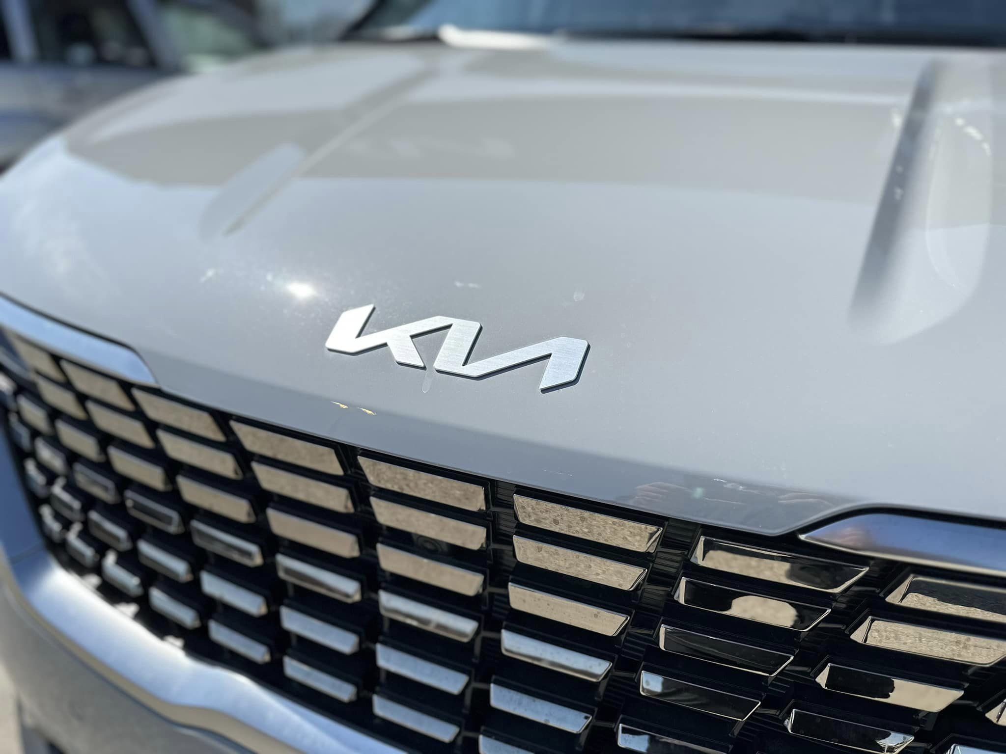 2023 Kia Carnival - Ceramic Gray - SX Prestige Trim - Grill View