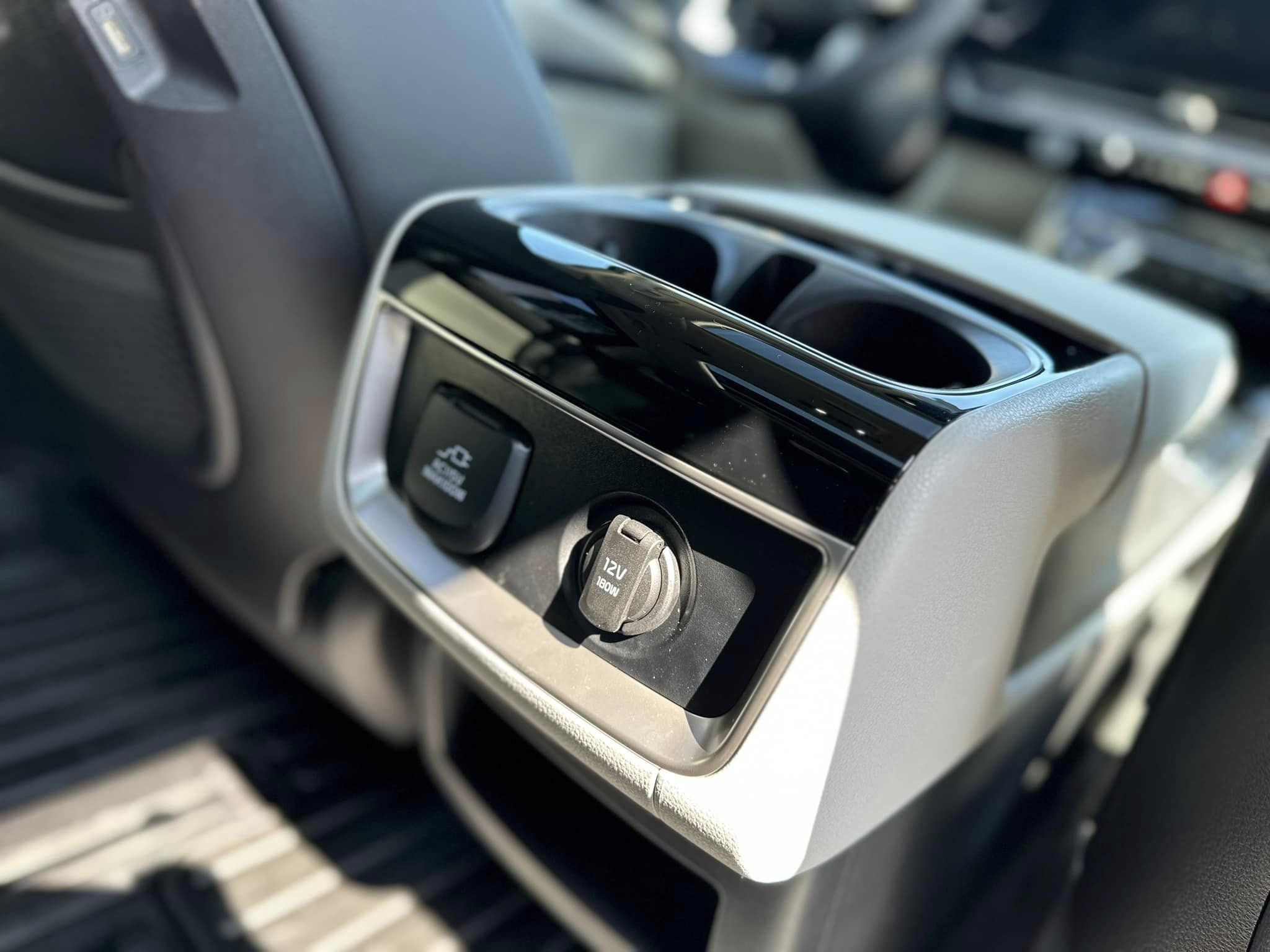 2023 Kia Carnival - Ceramic Gray - SX Prestige Trim - Center Console from 2nd Row View
