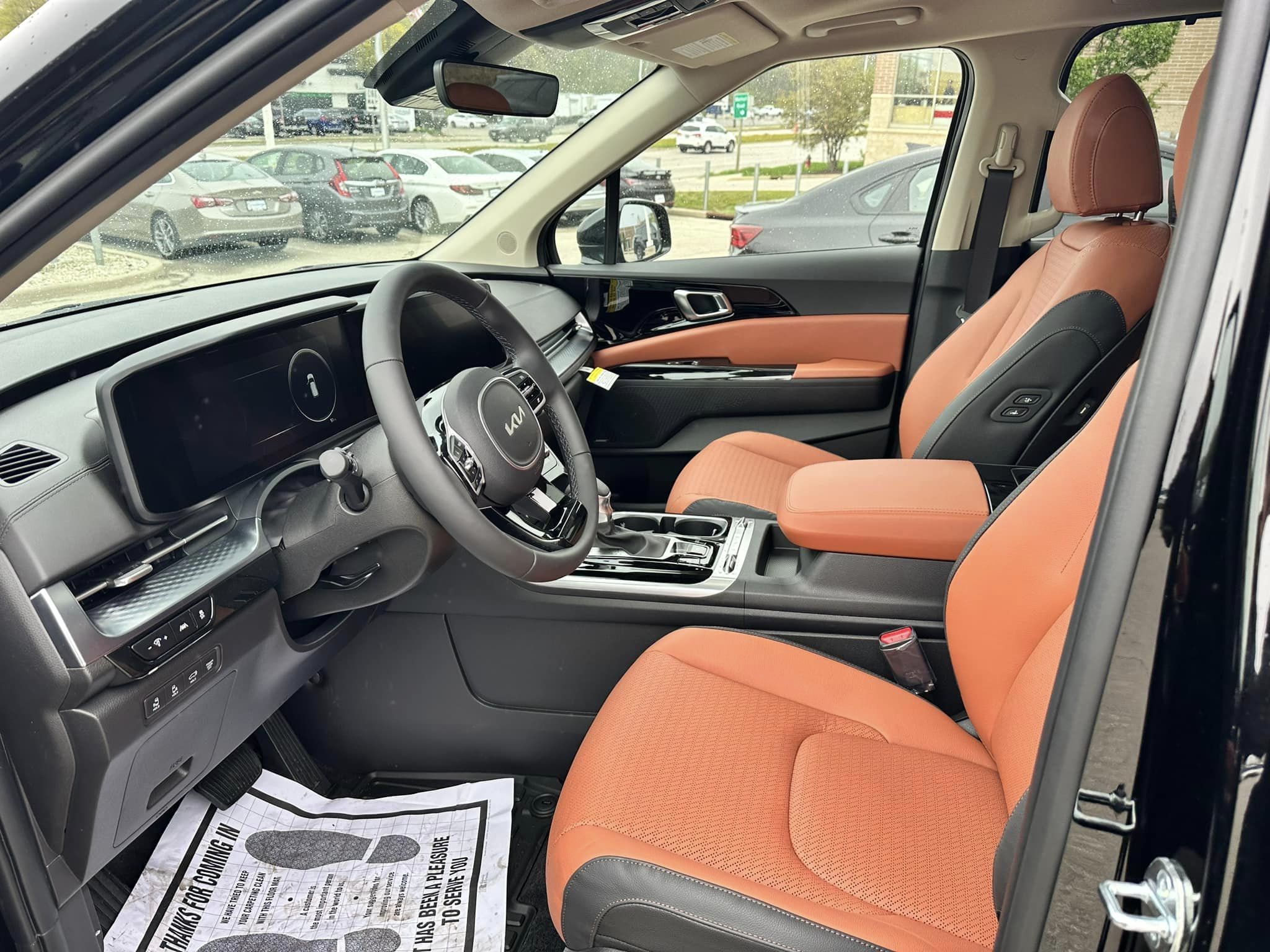 2023 Kia Carnival -  Aurora Black Pearl - SX Prestige Trim - Driver's View