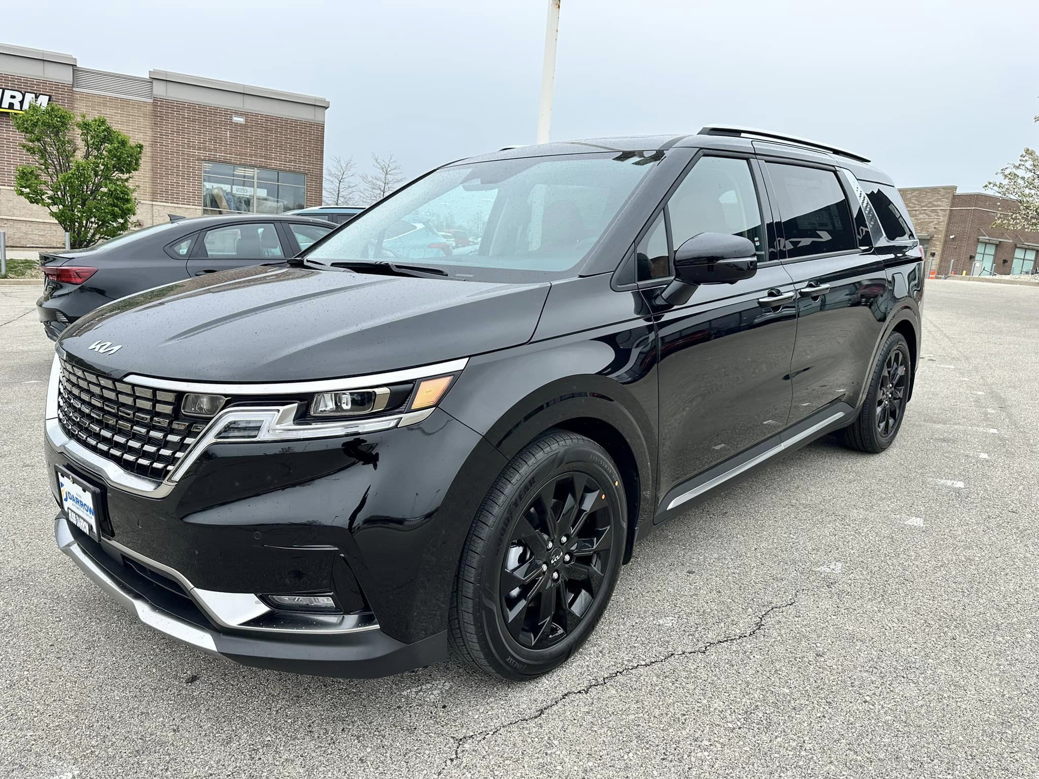 2023 Kia Carnival -  Aurora Black Pearl - SX Prestige Trim - Driver's Side Front View