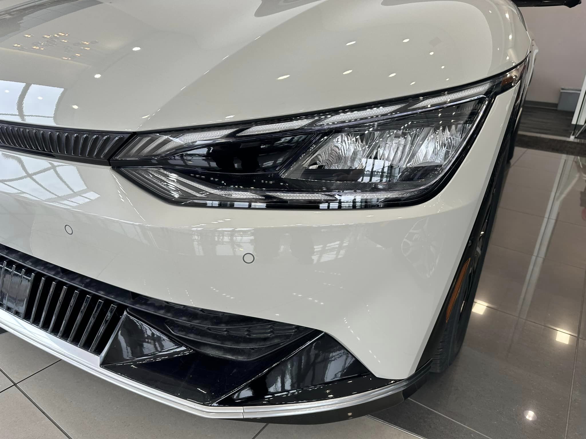 2023 Kia EV6 - Glacier - Wind Trim - Driver Side Front Lights Close Up