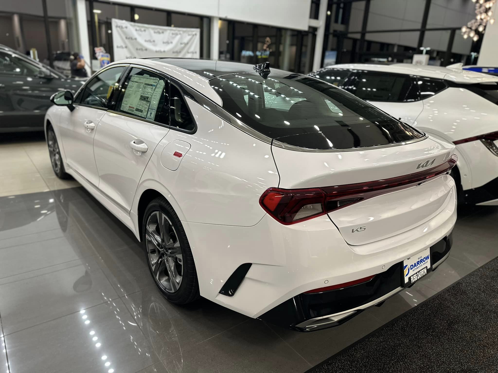 2023 Kia K5 - Glacial White Pearl - Rear Driver's Side View