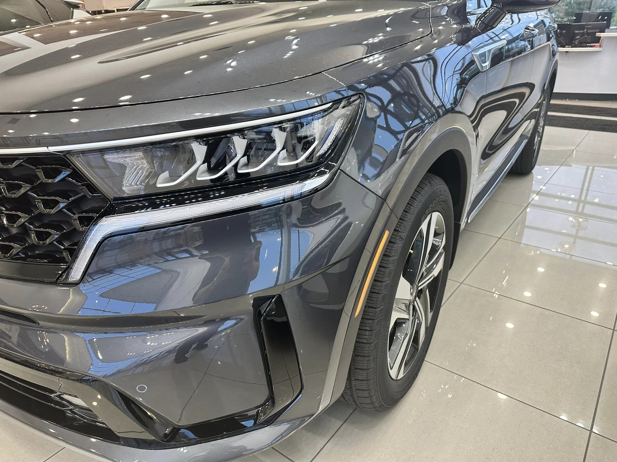 2023 Kia Sportage - Platinum Graphite - HEV Hybrid SX Prestige Trim - Driver's Side Grill Close Up
