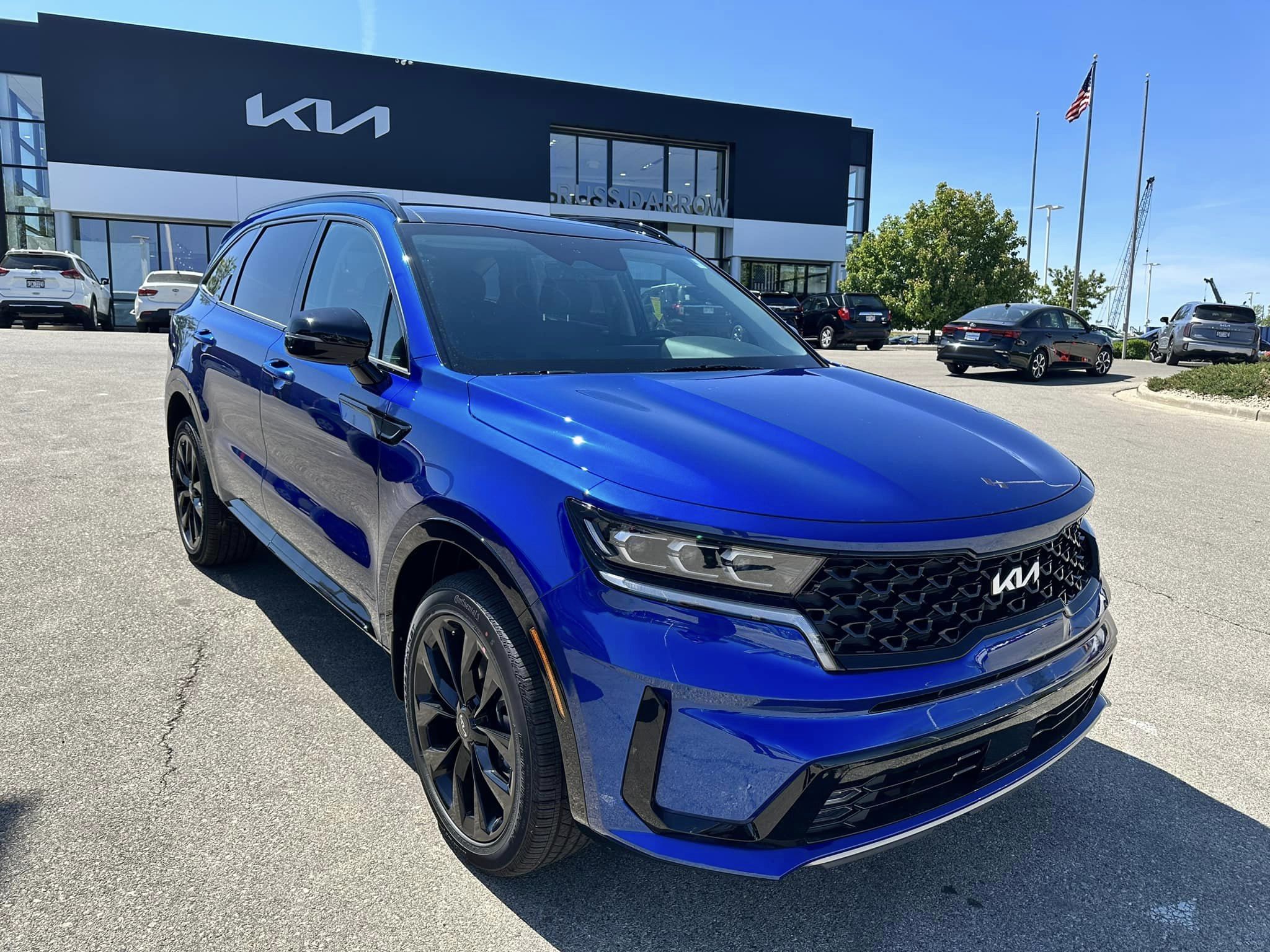 2023 Kia Sportage - Sapphire Blue - SX AWD Trim - Passenger Side Front View