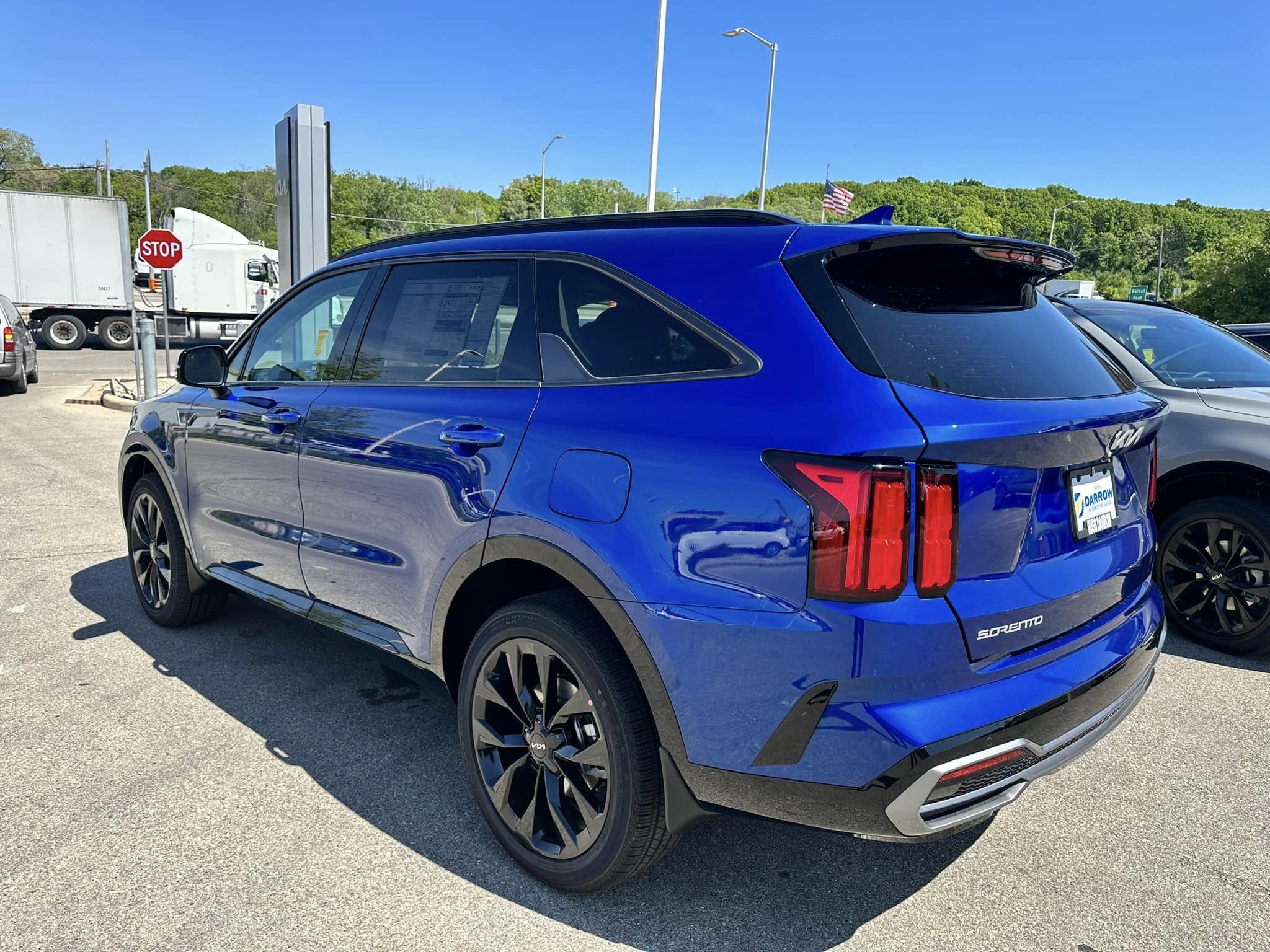 2023 Kia Sportage - Sapphire Blue - SX AWD Trim - Driver's Side Rear View