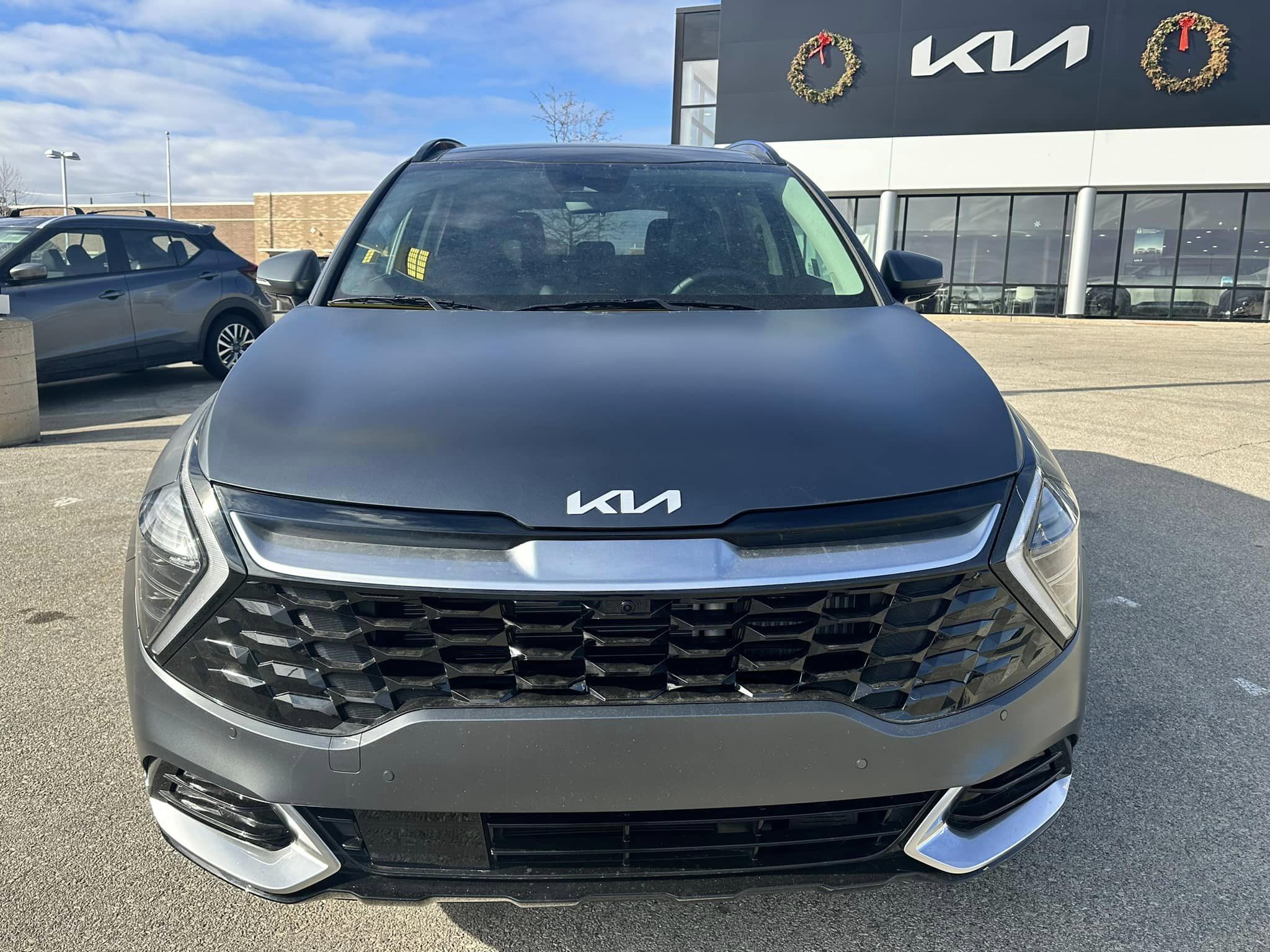 2024 Kia Sportage - Matte Gray/Black Interior - Hybrid HEV SX Prestige Trim - Front View