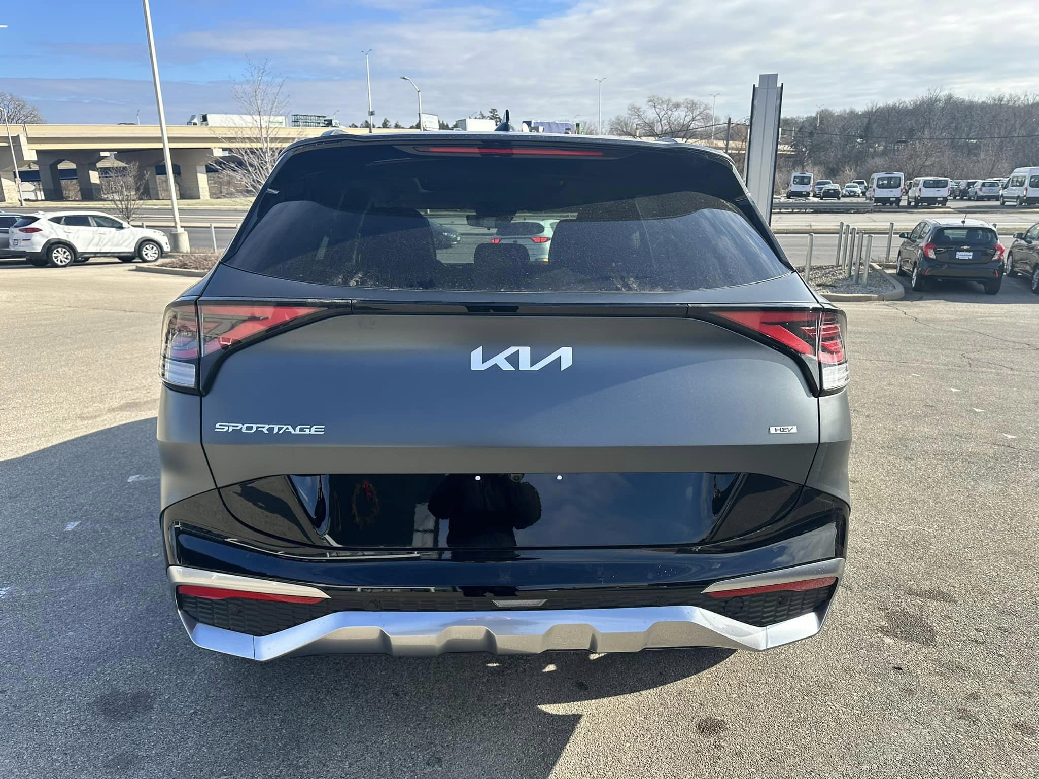 2024 Kia Sportage - Matte Gray/Black Interior - Hybrid HEV SX Prestige Trim - Rear View