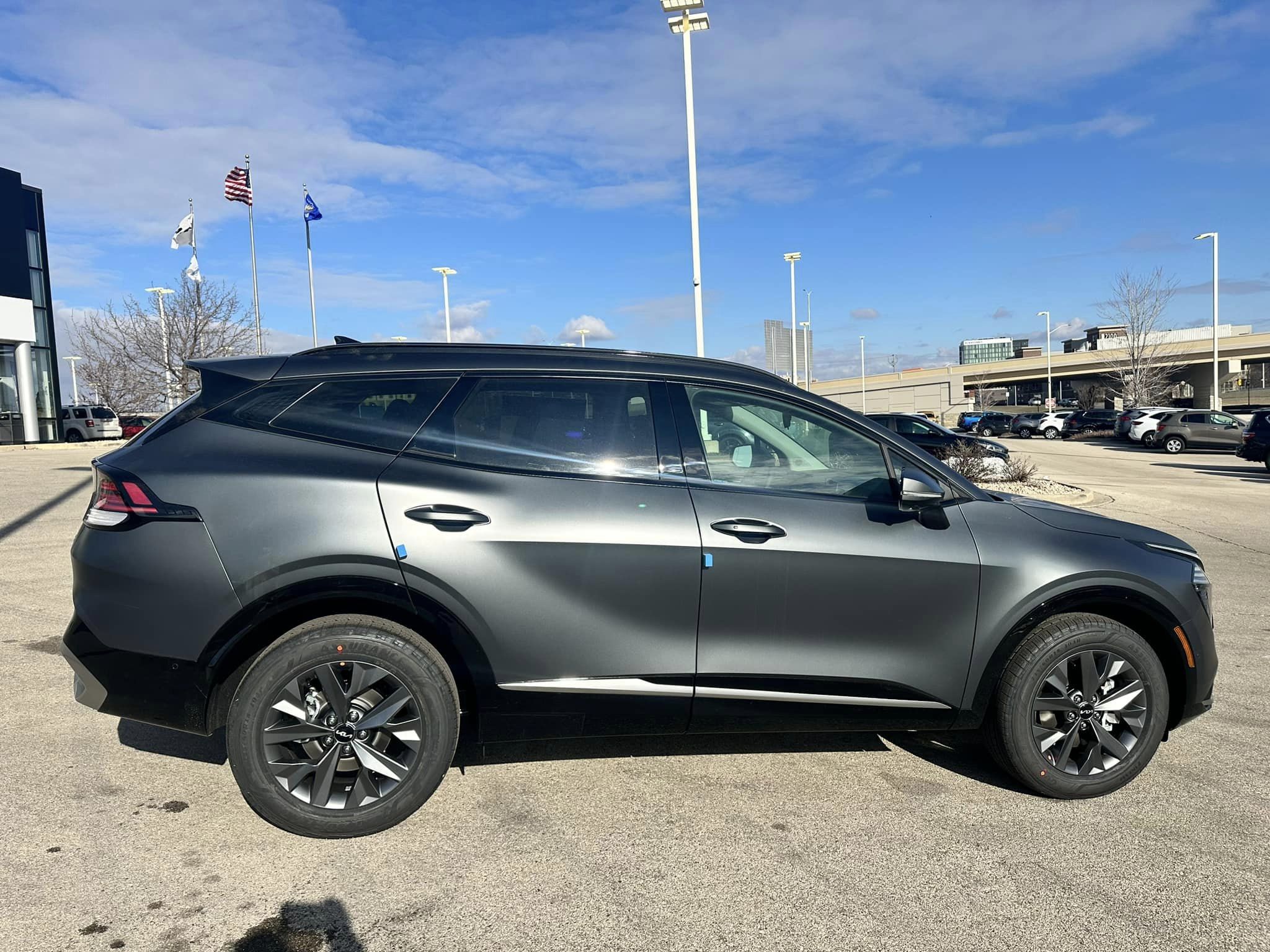 2024 Kia Sportage - Matte Gray/Black Interior - Hybrid HEV SX Prestige Trim - Passenger Side View