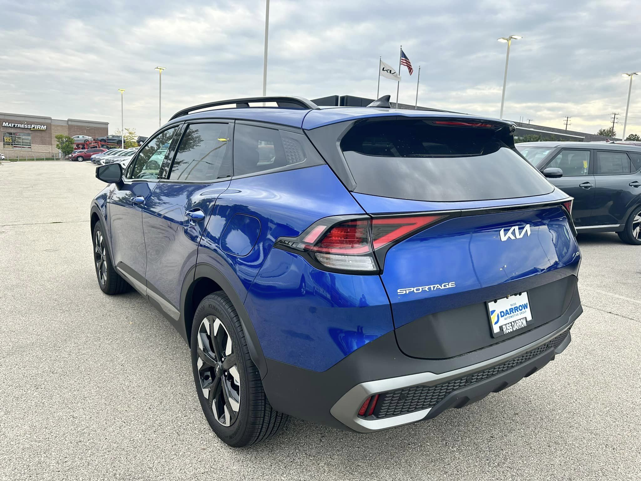 2024 Kia Sportage - Sapphire Blue - X-Line AWD Trim - Driver's Rear View