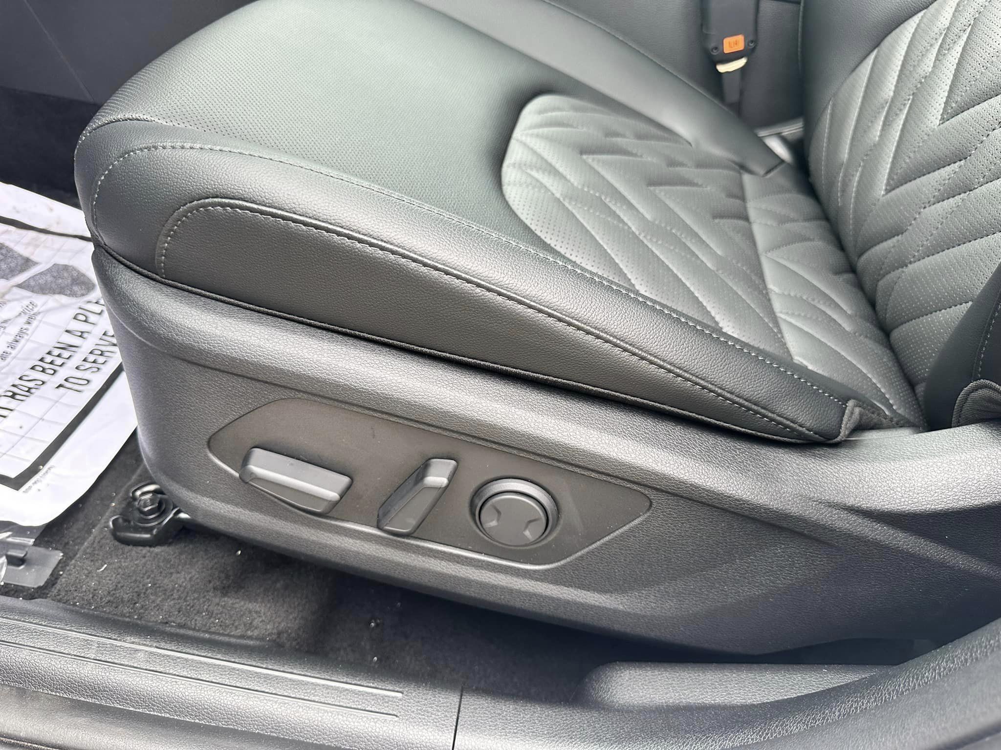 2024 Kia Sportage - Glacial White Pearl - X-Pro Prestige Trim - Driver Seat Controls