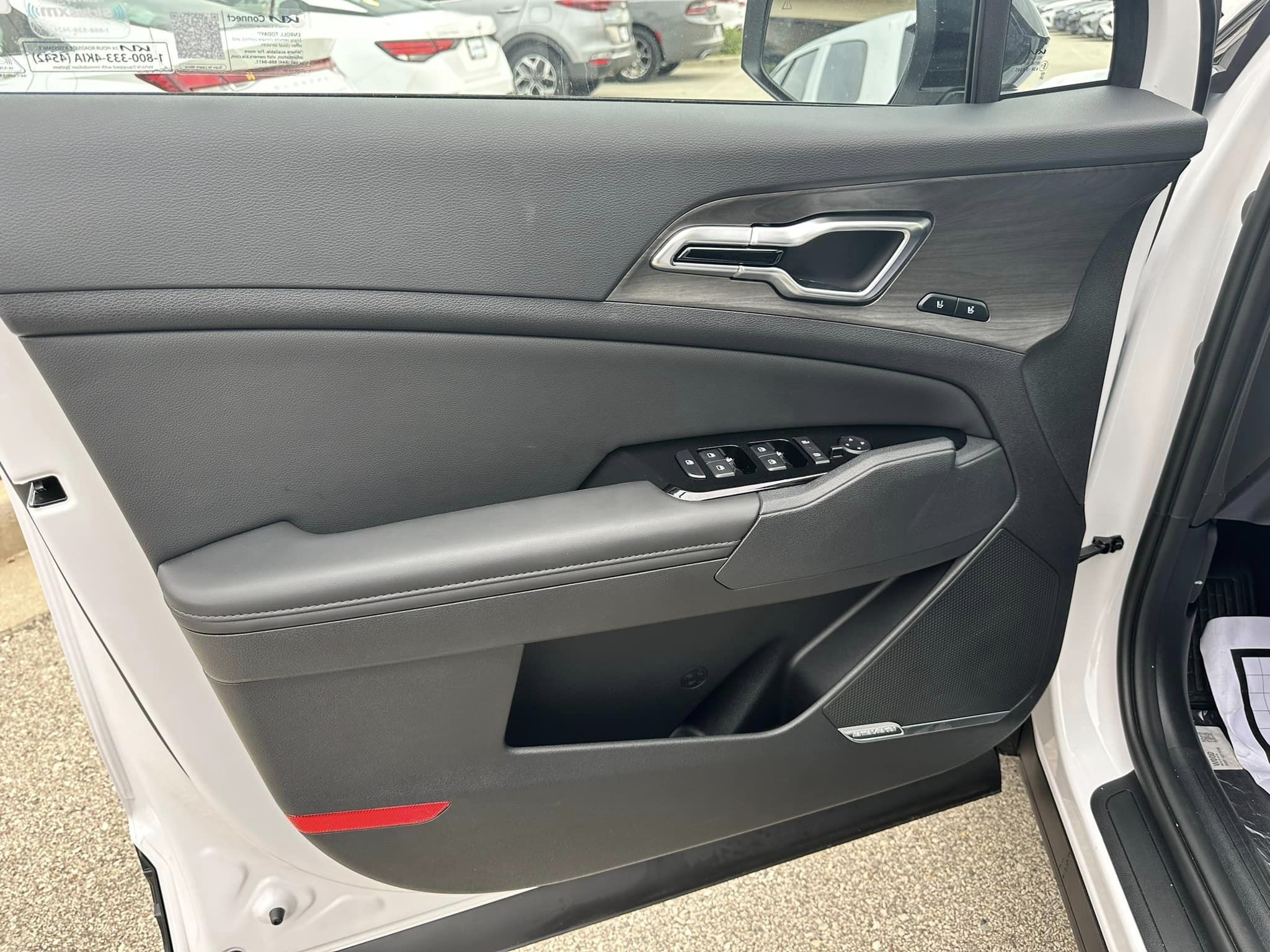 2024 Kia Sportage - Glacial White Pearl - X-Pro Prestige Trim - Driver Door